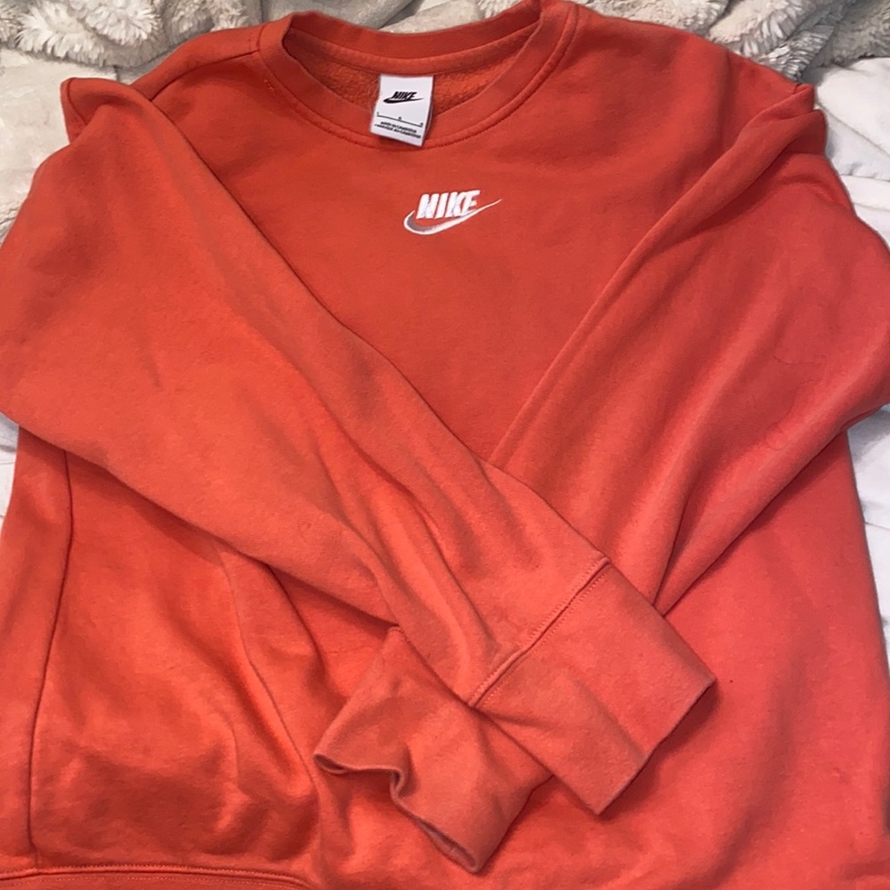 coral/orange crew neck